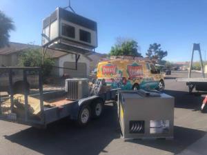Century Air Work Van hauling AC units