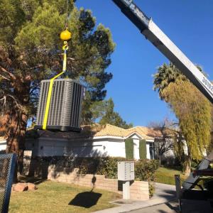Hauling an AC unit to a rooftop